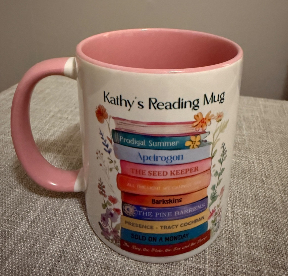 Kathy’s Reading Mug Pink Interior – Book Stack Design – Orca Coatings – EUC